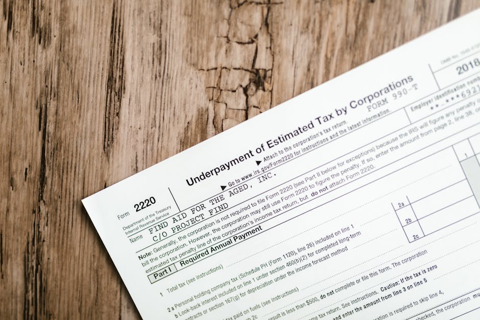 Business tax documents and financial reports on desk